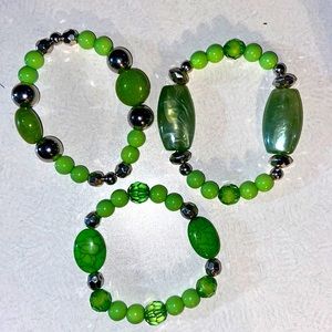 Small green and silver elastic beaded bracelets